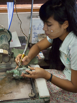 Polishing a Jade Figure Polishing a Jade Figure